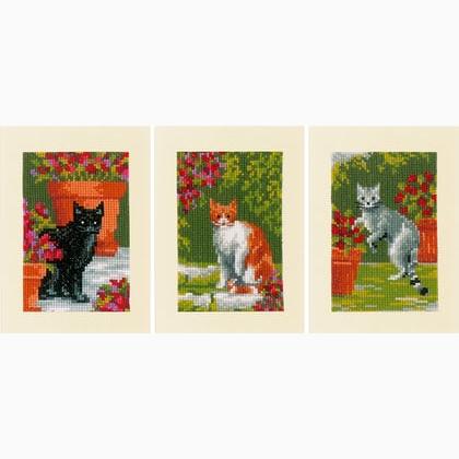Tarjetas de felicitaciones: Gatos entre flores