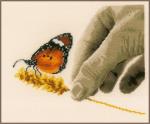 Mano y mariposa