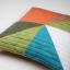 Almohada: Triángulos de colores 1