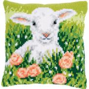 Almohada: Cordero entre flores