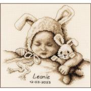 Bebé y Conejo de peluche