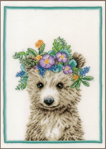 Oso con corona de flores