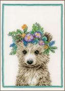 Oso con corona de flores