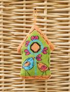 Una casita de pájaros enamorada