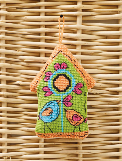 Una casita de pájaros enamorada