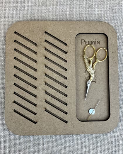 Expositor porta hilos