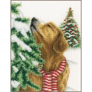 Perro en paisaje navideño